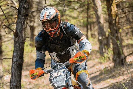 Tim riding through the trees